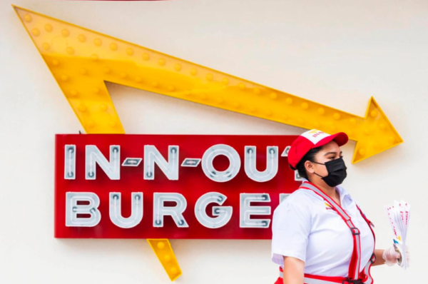 cheeseburgers with a smile in n out burger enforces no mask, all smiles policy for employees