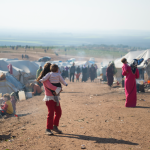 humanitarian crisis unfolds in lebanon as scores of people seek refuge in syria