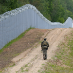 latvia border guard claims belarus is 'coordinating' irregular migrant crossings