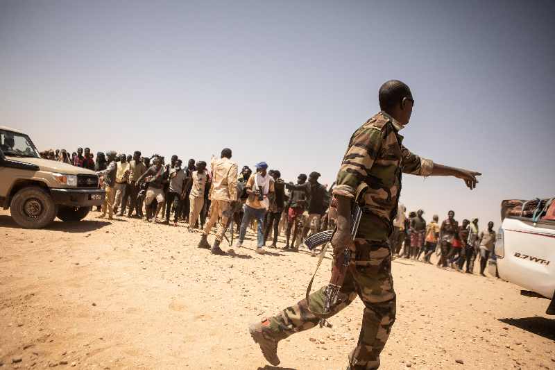 over 300 migrants detained in libyan desert by military forces