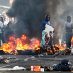 south africa minibus taxi drivers strike turns deadly, violent protests in cape town