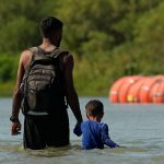 texas ordered to remove anti migrant barrier in rio grande