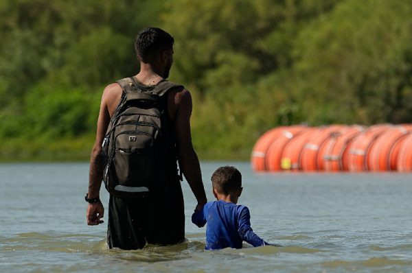 texas ordered to remove anti migrant barrier in rio grande