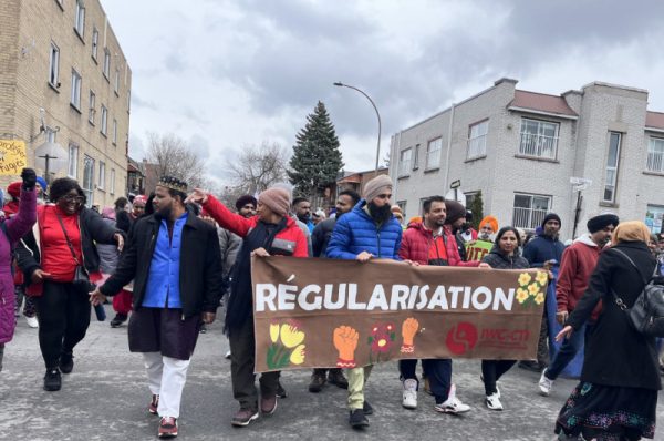 Protesters gathered in Montreal's Parc-Extension neighborhood on March 17, demanding a country-wide regularization program for undocumented immigrants living in Canada.